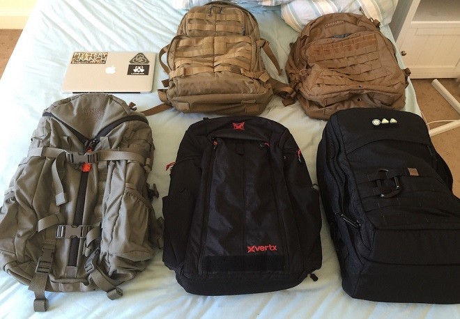 From top left to bottom, 13” MacBook Pro for scale, Rush 24, CamelBak Motherlode, Mystery Ranch 3DAP, Vertx EDC Gamut Plus, GORUCK GR2. 