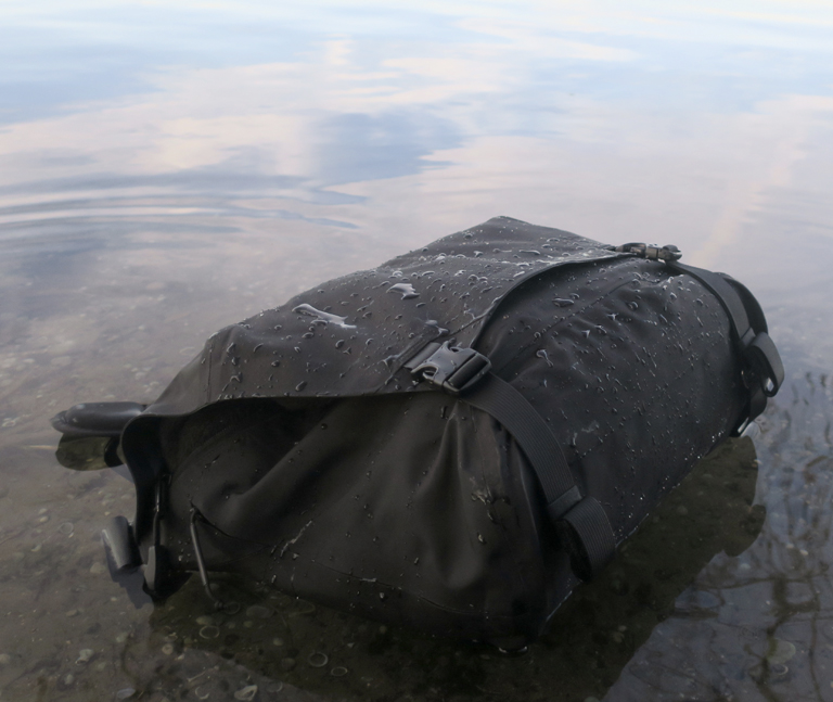 Arc'teryx-LEAF-Courier-Bag-15-floating-on-lake