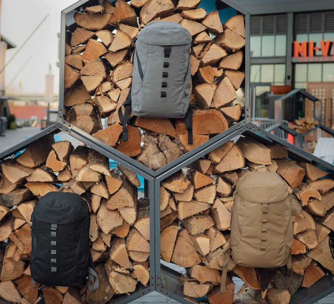 urban 30 backpacks on woodpile