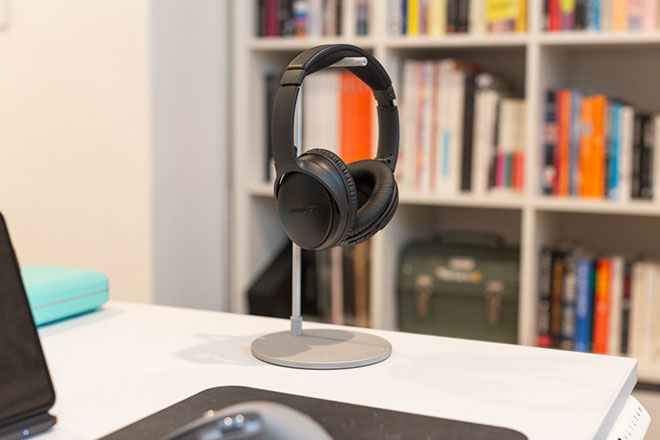 Bose QuietComfort 35 headphones and Master & Dynamic headphone stand