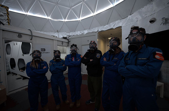 Sara Sabri, Alicja Musial, Eduardo Salazar Perez, Commander Dr Benjamin Pothier, Vice Commander Ola Kozawska, and Marcin Baraniecki throughout a chemical leak mock-up drill