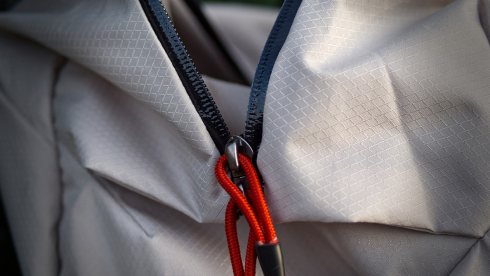 Lightweight duffel with weather-resistant zipper