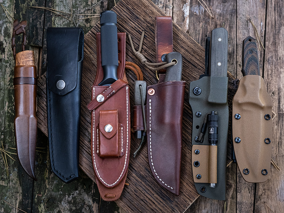 Left to right: Scandinavian-style open leather sheath, leather flap sheath, Randall-style sheath, bushcraft-style sheath, slim Kydex "taco" and classic Kydex "sandwich"