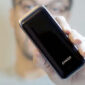 man holding anker power bank
