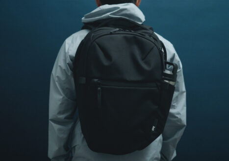 model wearing aer city backpack