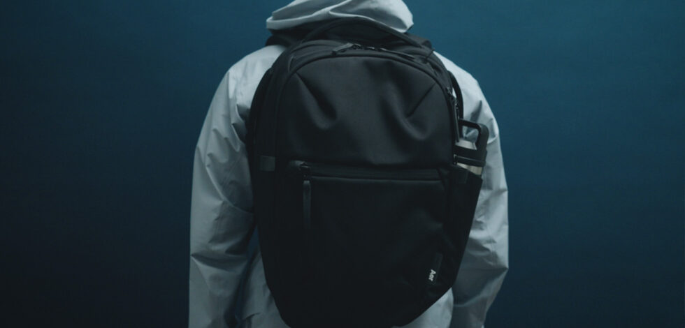 model wearing aer city backpack