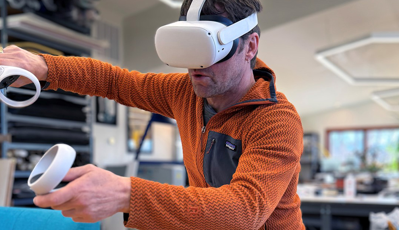 designer using VR to design a backpack