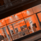 Orange lit retail fashion store
