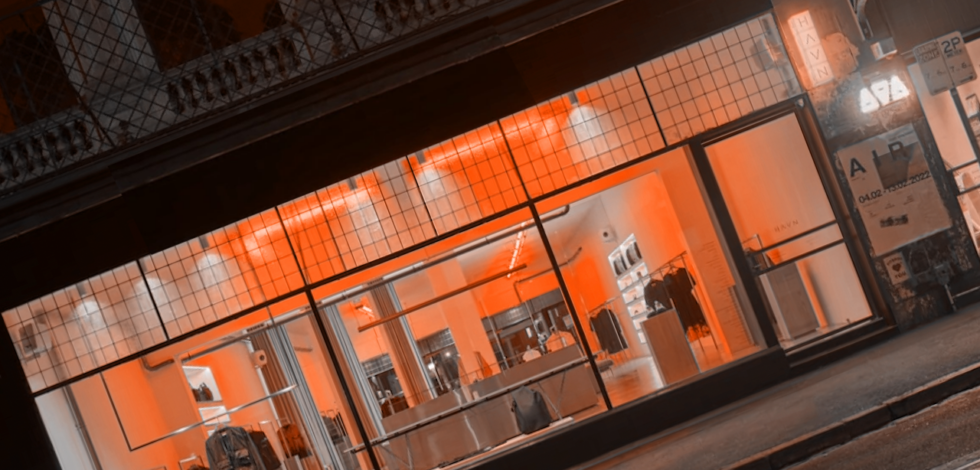 Orange lit retail fashion store