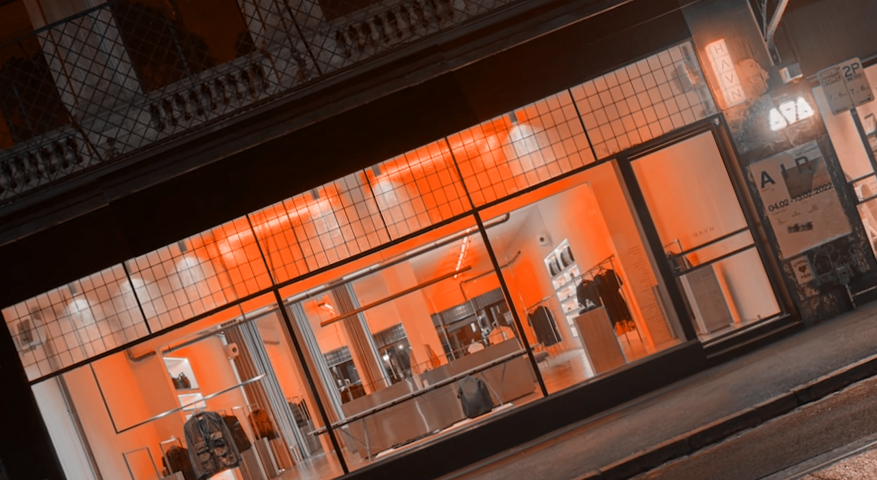 Orange lit retail fashion store