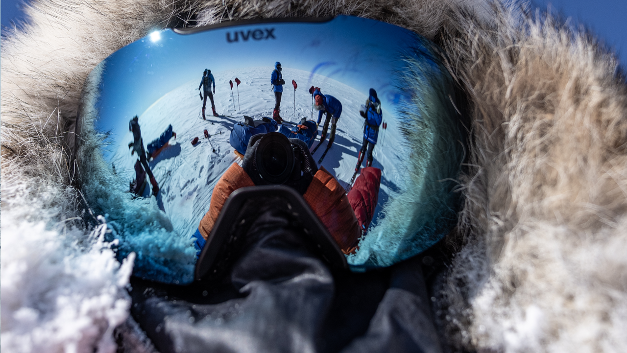 man with goggles in antarctica